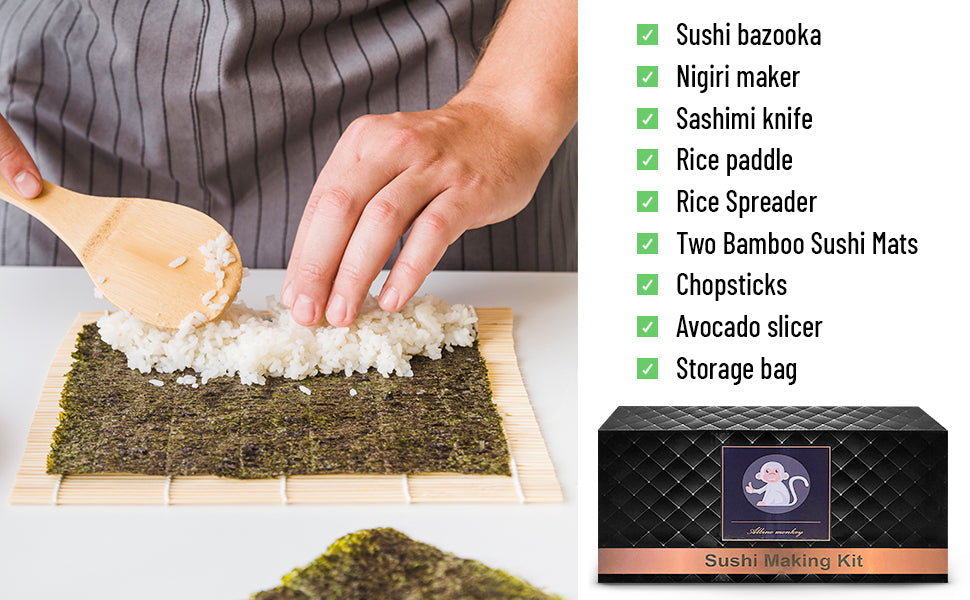 Sushi kit contents laid out including bamboo mat, rice mold and rolling tools