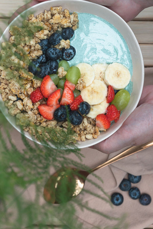 Overnight oats in a jar topped with fresh fruit